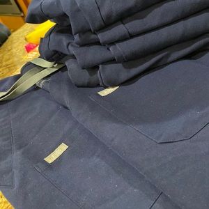 2 shirts and 4 pants scrubs Navy shirts are smalland pants are medium